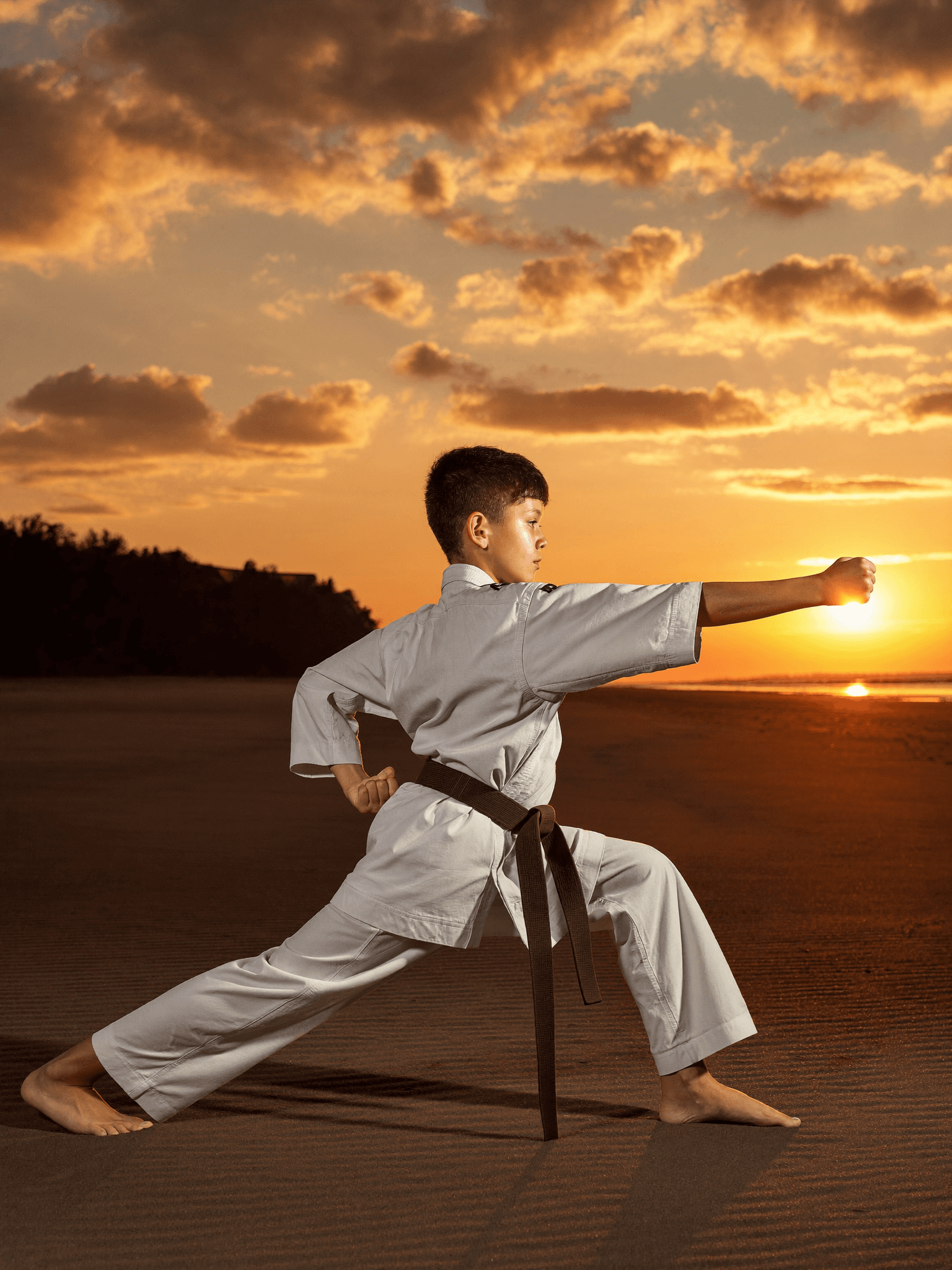 Young athlete training MMA at a partner gym, building confidence and discipline